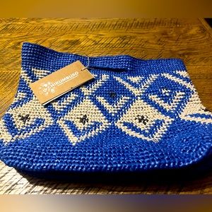 Beautiful handmade woven clutch made an Africa.